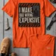Funny Electrician Tech Tee - Back "I Make Bad Wiring Expensive" — Front "Wired For Success" Vintage Work Tee — orange — Flat-lay Funny Electrician Tech Tee - Back "I Make Bad Wiring Expensive" — Front "Wired For Success" Vintage Work Tee — orange t-shirt, flat-lay product photo | Pressure Tested Co