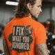 I Fix What You Ignored T-Shirt — Mechanic Wrench Tool Shirt for Technicians & DIYers — orange — Model I Fix What You Ignored T-Shirt — Mechanic Wrench Tool Shirt for Technicians & DIYers — orange t-shirt, model photo | Pressure Tested Co