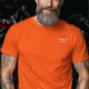 Funny Electrician Tech Tee - Back "I Make Bad Wiring Expensive" — Front "Wired For Success" Vintage Work Tee — orange — Model Funny Electrician Tech Tee - Back "I Make Bad Wiring Expensive" — Front "Wired For Success" Vintage Work Tee — orange t-shirt, model photo | Pressure Tested Co