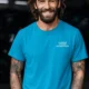 Funny Plumber Repair Graphic Tee "I Work Under Pressure" Back - "Plumbing Systems Diagnostician" Front — sapphire t-shirt, model photo | Pressure Tested Co