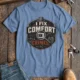 Funny HVAC Tech Tee "I Fix Comfort Crimes" — Furnace and Air Tech Work Tee — steel-blue — Flat-lay Funny HVAC Tech Tee "I Fix Comfort Crimes" — Furnace and Air Tech Work Tee — steel-blue t-shirt, flat-lay product photo | Pressure Tested Co