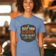 Funny HVAC Tee Shirt "Keep Your Cool. I'll Fix The Rest." T-Shirt – Vintage GraphicTee — steel-blue — Model Funny HVAC Tee Shirt "Keep Your Cool. I'll Fix The Rest." T-Shirt – Vintage GraphicTee — steel-blue t-shirt, model photo | Pressure Tested Co