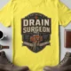 yellow-flatlay Drain Surgeon