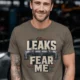 Leaks Fear Me T-Shirt - Funny Plumber Pipes Tee — army t-shirt, model photo | Pressure Tested Co
