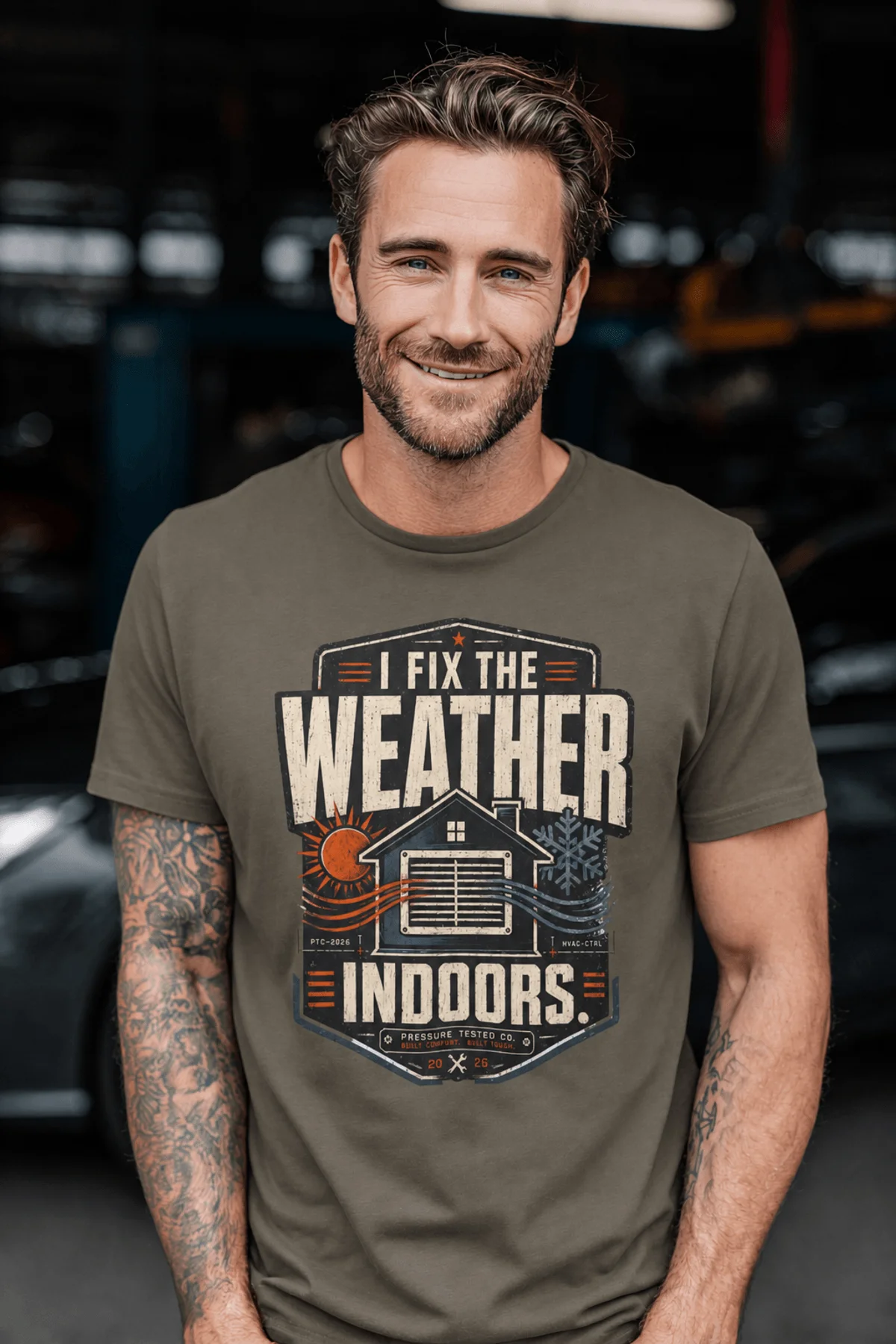 Funny HVAC Technician Tee - “I Fix The Weather Indoors.” Cooling/Furnace Shop Work Shirt — army — Model Funny HVAC Technician Tee - “I Fix The Weather Indoors.” Cooling/Furnace Shop Work Shirt — army t-shirt, model photo | Pressure Tested Co