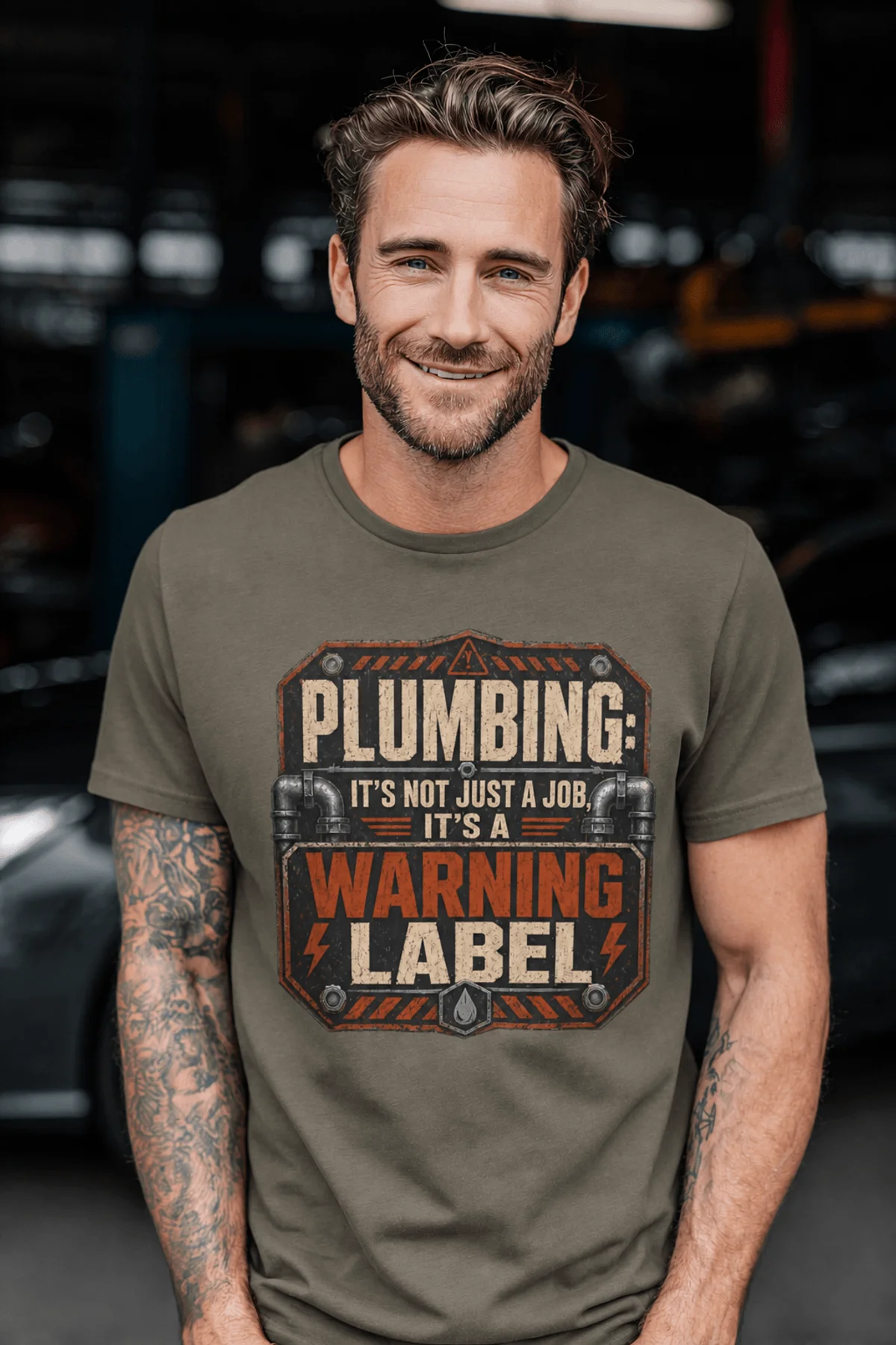 Plumbing Warning Label T-Shirt — Funny Plumber Shirt — army t-shirt, model photo | Pressure Tested Co