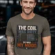 HVAC Technician Tee — “THE COIL WAS DIRTY. SO WAS MY MOOD.” — army — Model HVAC Technician Tee — “THE COIL WAS DIRTY. SO WAS MY MOOD.” — army t-shirt, model photo | Pressure Tested Co