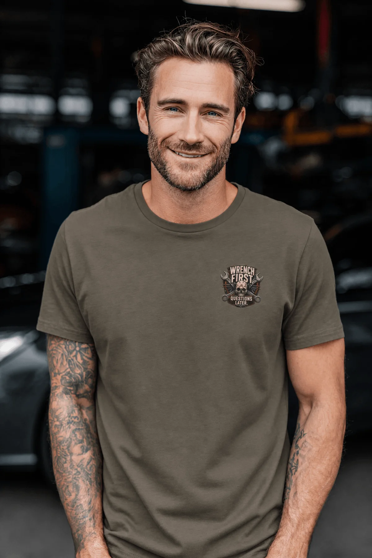 Wrench First Tee — "Wrench First, Questions Later" Mechanic Skull T-Shirt — army t-shirt, model photo | Pressure Tested Co