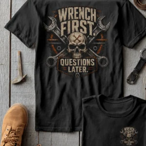 Wrench First Tee — "Wrench First, Questions Later" Mechanic Skull T-Shirt — asphalt t-shirt, flat-lay product photo | Pressure Tested Co