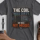 HVAC Technician Tee — “THE COIL WAS DIRTY. SO WAS MY MOOD.” — asphalt — Flat-lay HVAC Technician Tee — “THE COIL WAS DIRTY. SO WAS MY MOOD.” — asphalt t-shirt, flat-lay product photo | Pressure Tested Co