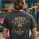 Wrench First Tee — "Wrench First, Questions Later" Mechanic Skull T-Shirt — asphalt t-shirt, model photo | Pressure Tested Co
