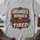 Grounded, Bonded and Slightly Tired Graphic Tee — Funny Electrical Worker Shirt — athletic-heather t-shirt, flat-lay product photo | Pressure Tested Co