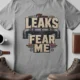 Leaks Fear Me T-Shirt - Funny Plumber Pipes Tee — athletic-heather t-shirt, flat-lay product photo | Pressure Tested Co
