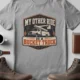 Bucket Truck T-Shirt - “My Other Ride Is A Bucket Truck” Utility Crew/Electrician Tee — athletic-heather t-shirt, flat-lay product photo | Pressure Tested Co