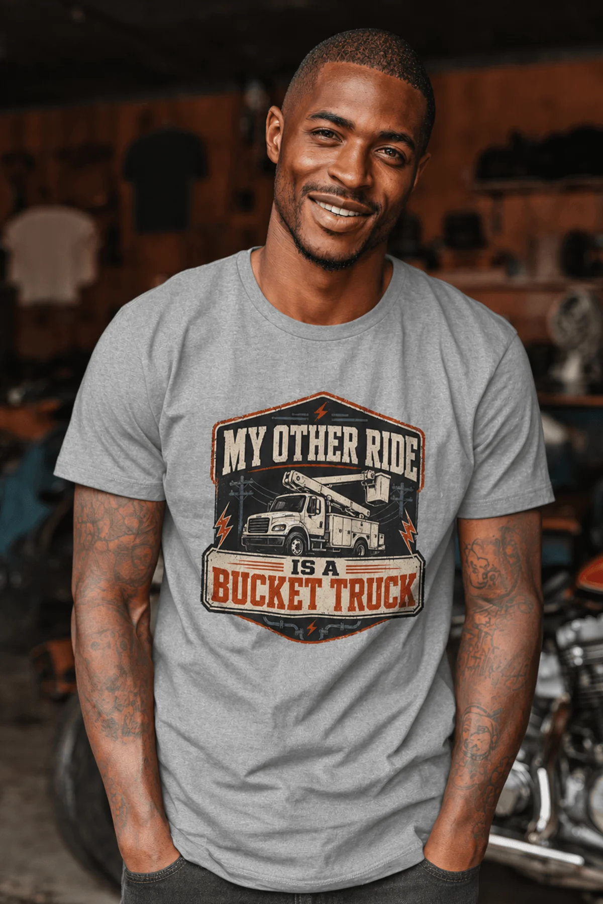 Bucket Truck T-Shirt - “My Other Ride Is A Bucket Truck” Utility Crew/Electrician Tee — athletic-heather t-shirt, model photo | Pressure Tested Co