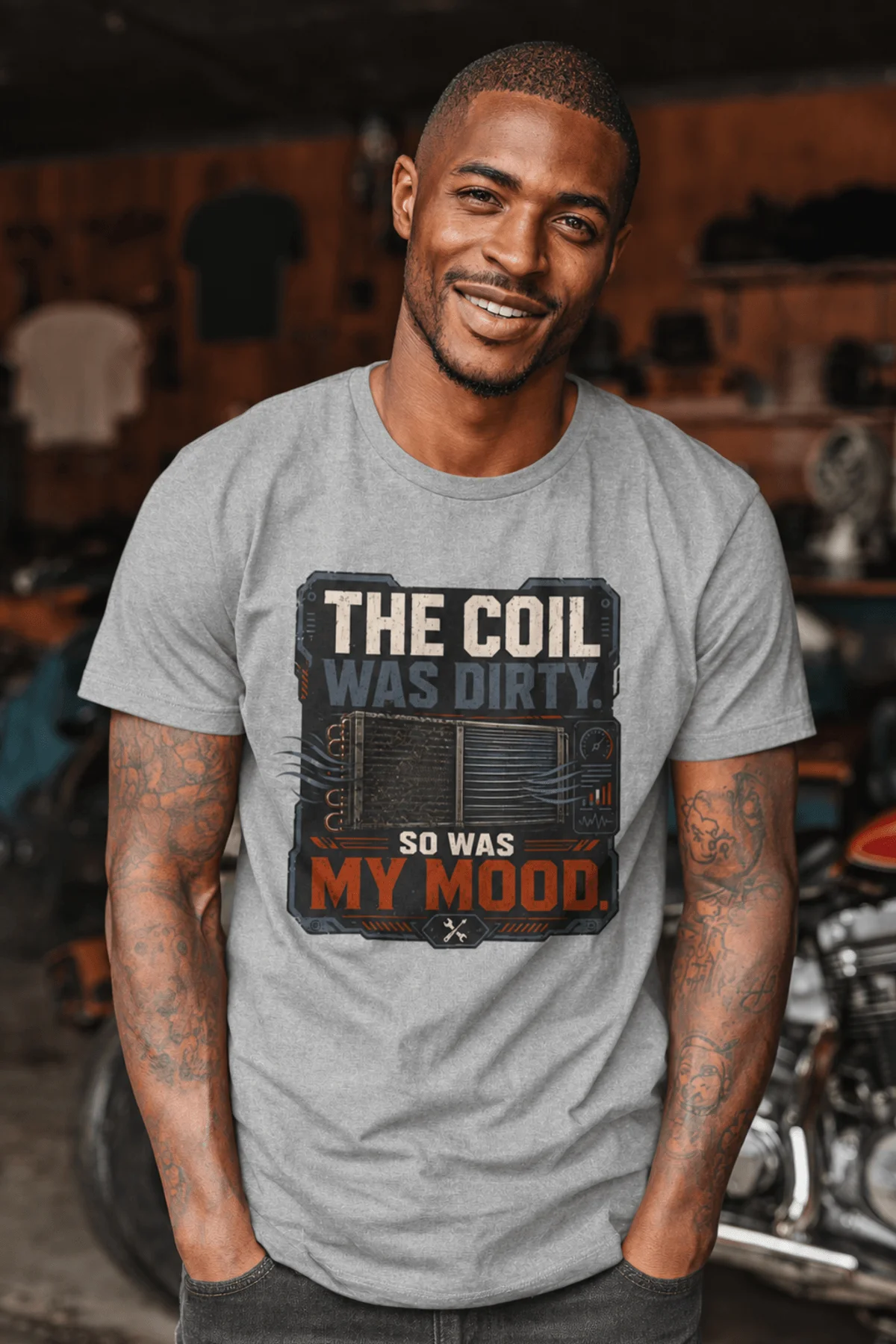 HVAC Technician Tee — “THE COIL WAS DIRTY. SO WAS MY MOOD.” — athletic-heather — Model HVAC Technician Tee — “THE COIL WAS DIRTY. SO WAS MY MOOD.” — athletic-heather t-shirt, model photo | Pressure Tested Co