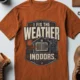 Funny HVAC Technician Tee - “I Fix The Weather Indoors.” Cooling/Furnace Shop Work Shirt — autumn — Flat-lay Funny HVAC Technician Tee - “I Fix The Weather Indoors.” Cooling/Furnace Shop Work Shirt — autumn t-shirt, flat-lay product photo | Pressure Tested Co