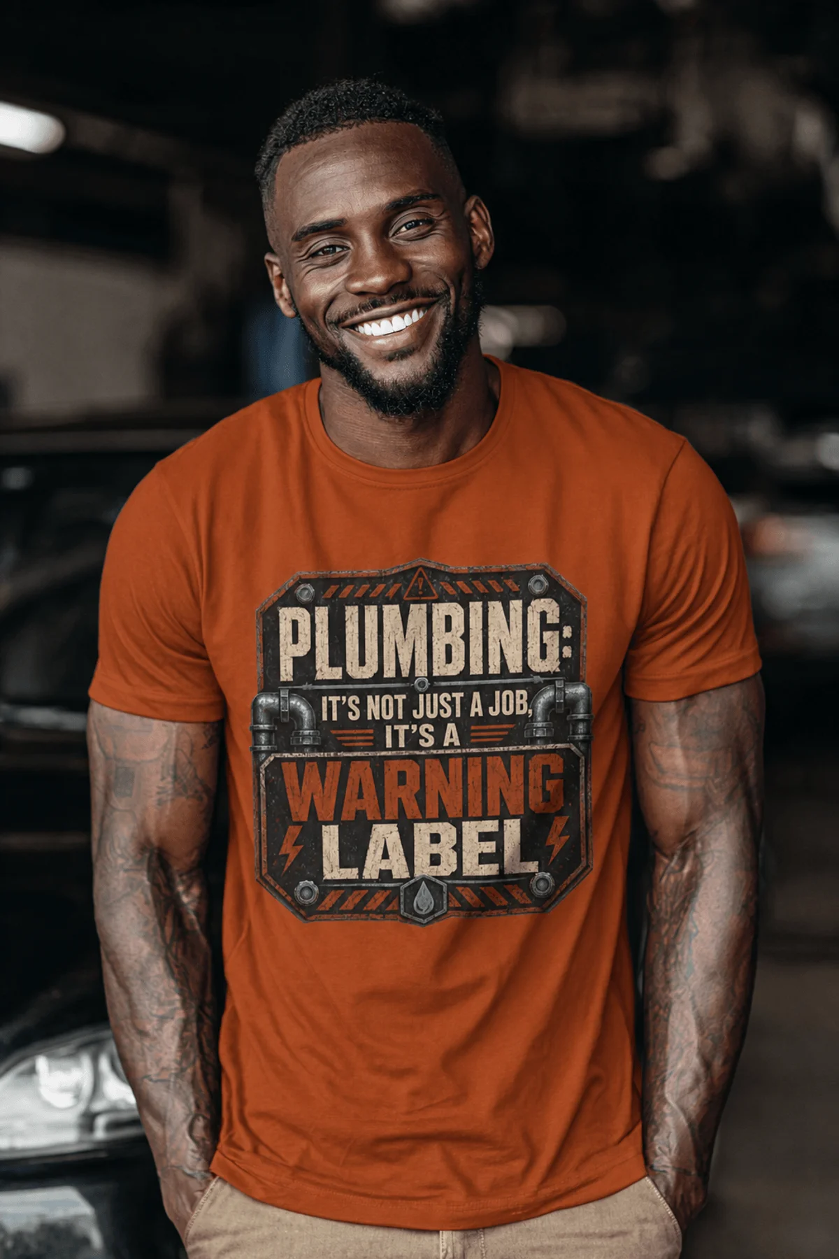 Plumbing Warning Label T-Shirt — Funny Plumber Shirt — autumn t-shirt, model photo | Pressure Tested Co