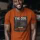 HVAC Technician Tee — “THE COIL WAS DIRTY. SO WAS MY MOOD.” — autumn — Model HVAC Technician Tee — “THE COIL WAS DIRTY. SO WAS MY MOOD.” — autumn t-shirt, model photo | Pressure Tested Co