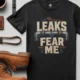 Leaks Fear Me T-Shirt - Funny Plumber Pipes Tee — black t-shirt, flat-lay product photo | Pressure Tested Co