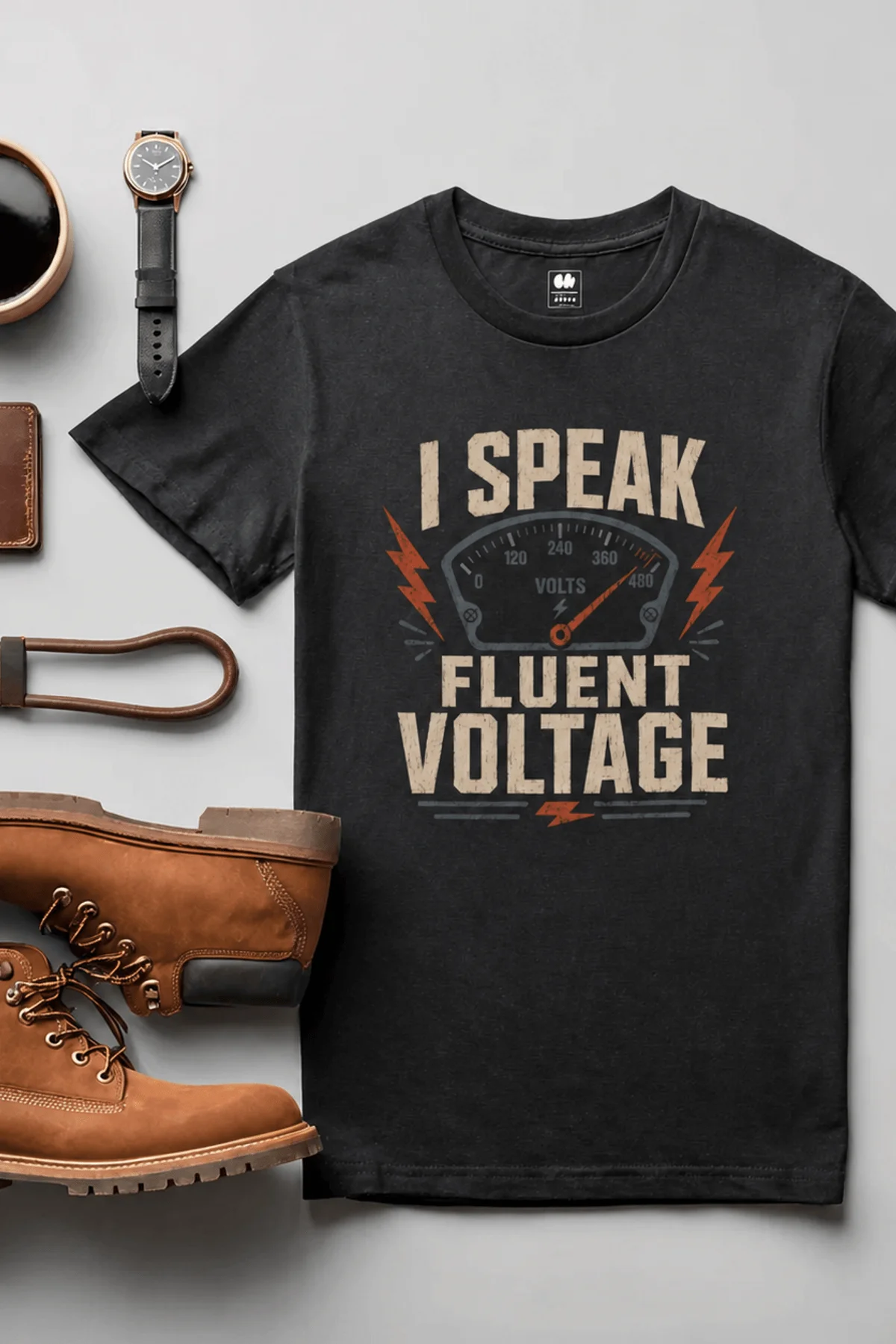 I Speak Fluent Voltage T-Shirt — Electrician & Electronics Tech Gift — black t-shirt, flat-lay product photo | Pressure Tested Co