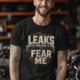 Leaks Fear Me T-Shirt - Funny Plumber Pipes Tee — black t-shirt, model photo | Pressure Tested Co