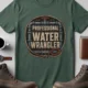 Funny Plumber Tee - "Professional Water Wrangler" Rustic Rope Graphic T-Shirt — blue-spruce t-shirt, flat-lay product photo | Pressure Tested Co