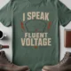 I Speak Fluent Voltage T-Shirt — Electrician & Electronics Tech Gift — blue-spruce t-shirt, flat-lay product photo | Pressure Tested Co