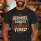 Grounded, Bonded and Slightly Tired Graphic Tee — Funny Electrical Worker Shirt — dark-grey t-shirt, model photo | Pressure Tested Co