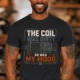 HVAC Technician Tee — “THE COIL WAS DIRTY. SO WAS MY MOOD.” — dark-grey — Model HVAC Technician Tee — “THE COIL WAS DIRTY. SO WAS MY MOOD.” — dark-grey t-shirt, model photo | Pressure Tested Co