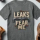 Leaks Fear Me T-Shirt - Funny Plumber Pipes Tee — deep-heather t-shirt, flat-lay product photo | Pressure Tested Co