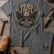 Wrench First Tee — "Wrench First, Questions Later" Mechanic Skull T-Shirt — deep-heather t-shirt, flat-lay product photo | Pressure Tested Co