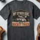 Bucket Truck T-Shirt - “My Other Ride Is A Bucket Truck” Utility Crew/Electrician Tee — deep-heather t-shirt, flat-lay product photo | Pressure Tested Co
