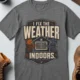 Funny HVAC Technician Tee - “I Fix The Weather Indoors.” Cooling/Furnace Shop Work Shirt — deep-heather — Flat-lay Funny HVAC Technician Tee - “I Fix The Weather Indoors.” Cooling/Furnace Shop Work Shirt — deep-heather t-shirt, flat-lay product photo | Pressure Tested Co