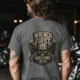 Wrench First Tee — "Wrench First, Questions Later" Mechanic Skull T-Shirt — deep-heather t-shirt, model photo | Pressure Tested Co