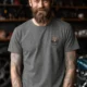 Wrench First Tee — "Wrench First, Questions Later" Mechanic Skull T-Shirt — deep-heather t-shirt, model photo | Pressure Tested Co