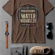 Funny Plumber Tee - "Professional Water Wrangler" Rustic Rope Graphic T-Shirt — espresso t-shirt, flat-lay product photo | Pressure Tested Co