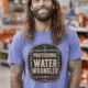 Funny Plumber Tee - "Professional Water Wrangler" Rustic Rope Graphic T-Shirt — flo-blue t-shirt, model photo | Pressure Tested Co