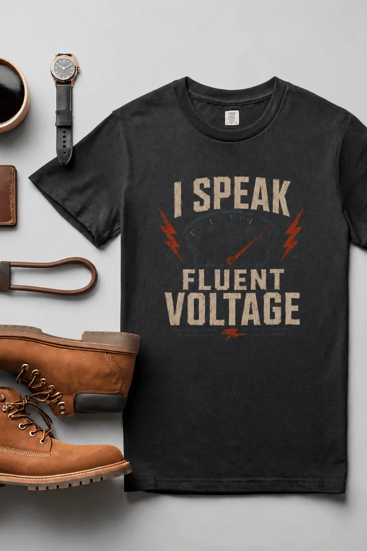 I Speak Fluent Voltage T-Shirt — Electrician & Electronics Tech Gift — graphite t-shirt, flat-lay product photo | Pressure Tested Co