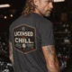 Funny HVAC Tee - "Licensed To Chill" HVAC Technician T-Shirt — graphite t-shirt, model photo | Pressure Tested Co