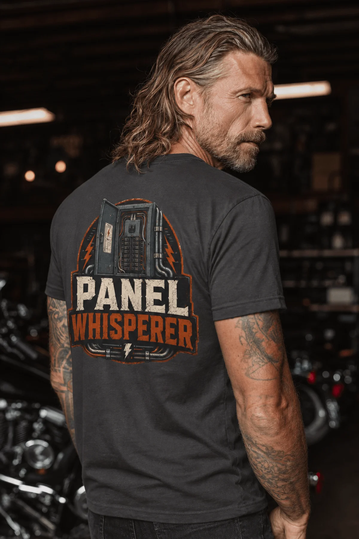 Funny Electrician Tee - "Panel Whisperer" Electrical Worker T-Shirt — graphite t-shirt, model photo | Pressure Tested Co