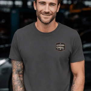 Funny HVAC Tee - "Licensed To Chill" HVAC Technician T-Shirt — graphite t-shirt, model photo | Pressure Tested Co