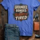 Grounded, Bonded and Slightly Tired Graphic Tee — Funny Electrical Worker Shirt — heather-columbia-blue t-shirt, flat-lay product photo | Pressure Tested Co