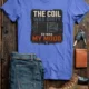 HVAC Technician Tee — “THE COIL WAS DIRTY. SO WAS MY MOOD.” — heather-columbia-blue — Flat-lay HVAC Technician Tee — “THE COIL WAS DIRTY. SO WAS MY MOOD.” — heather-columbia-blue t-shirt, flat-lay product photo | Pressure Tested Co