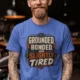 Grounded, Bonded and Slightly Tired Graphic Tee — Funny Electrical Worker Shirt — heather-columbia-blue t-shirt, model photo | Pressure Tested Co