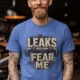 Leaks Fear Me T-Shirt - Funny Plumber Pipes Tee — heather-columbia-blue t-shirt, model photo | Pressure Tested Co