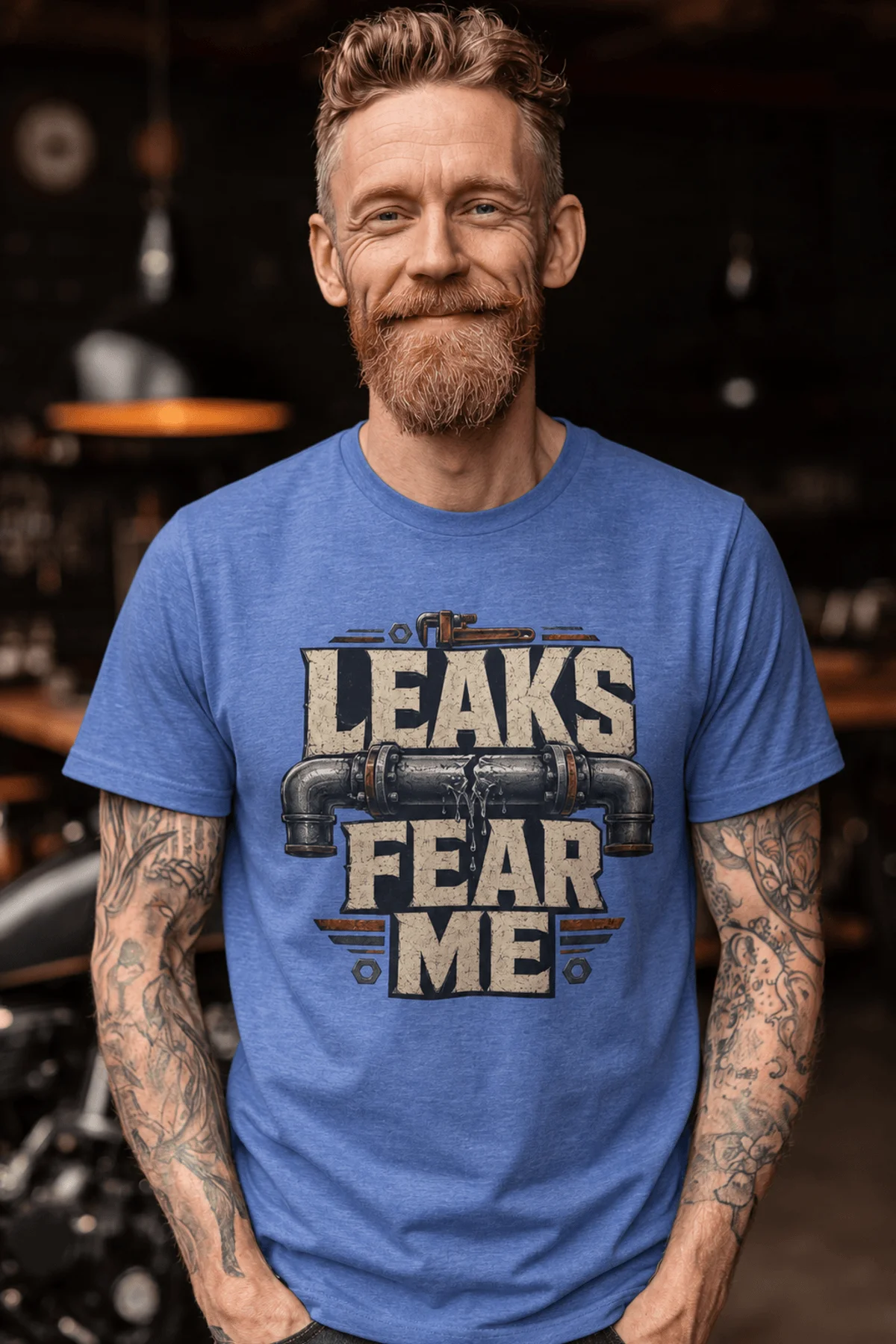 Leaks Fear Me T-Shirt - Funny Plumber Pipes Tee — heather-columbia-blue t-shirt, model photo | Pressure Tested Co