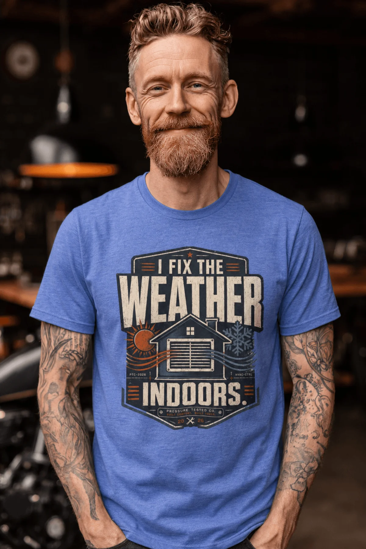 Funny HVAC Technician Tee - “I Fix The Weather Indoors.” Cooling/Furnace Shop Work Shirt — heather-columbia-blue — Model Funny HVAC Technician Tee - “I Fix The Weather Indoors.” Cooling/Furnace Shop Work Shirt — heather-columbia-blue t-shirt, model photo | Pressure Tested Co