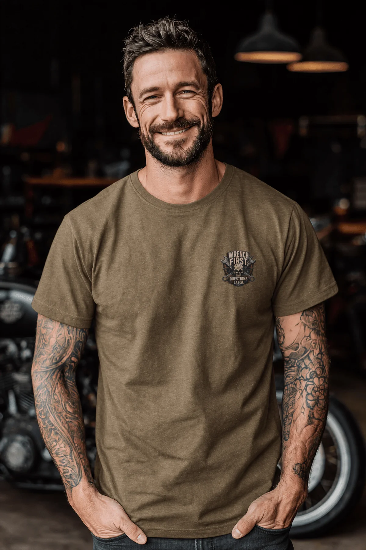 Wrench First Tee — "Wrench First, Questions Later" Mechanic Skull T-Shirt — heather-olive t-shirt, model photo | Pressure Tested Co