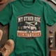 Bucket Truck T-Shirt - “My Other Ride Is A Bucket Truck” Utility Crew/Electrician Tee — kelly t-shirt, flat-lay product photo | Pressure Tested Co
